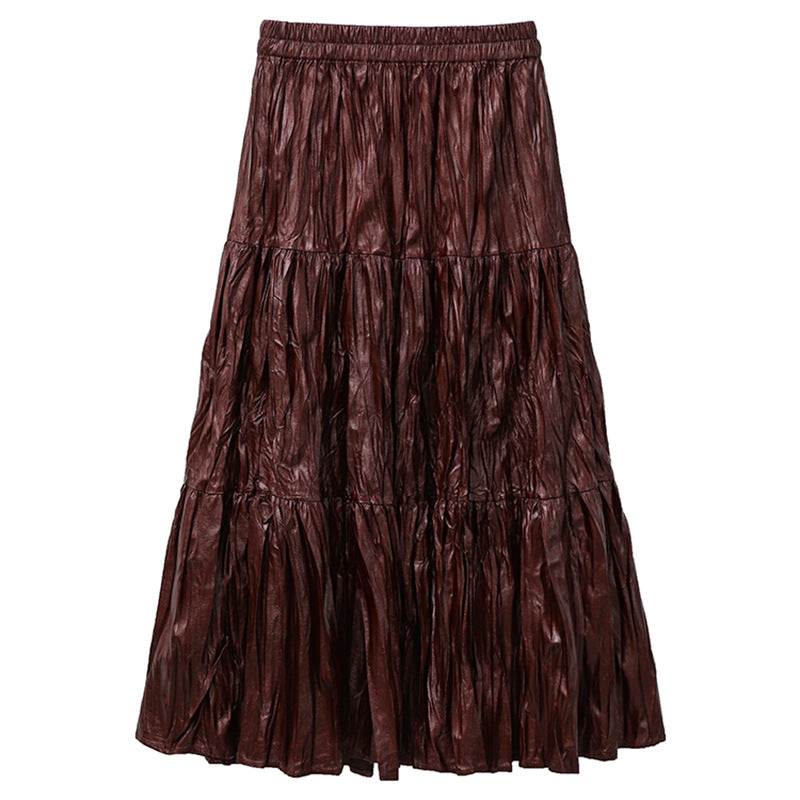 Women's tiered maxi skirt in coated crinkle material with elastic comfort waistband Mune Fashion