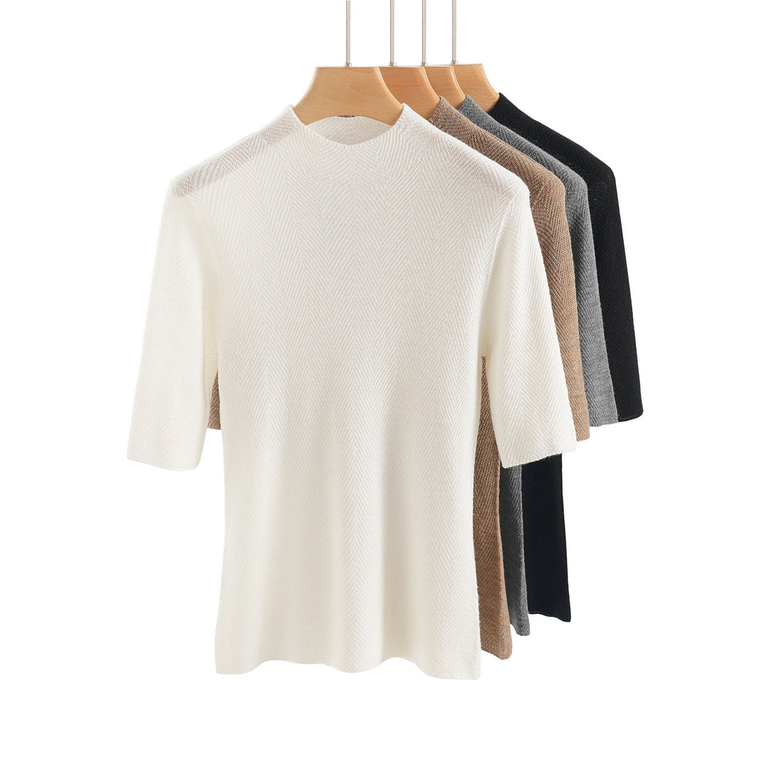 Women's fine-knit top with stand-up collar, elbow-length sleeves, and herringbone structure Mune Fashion