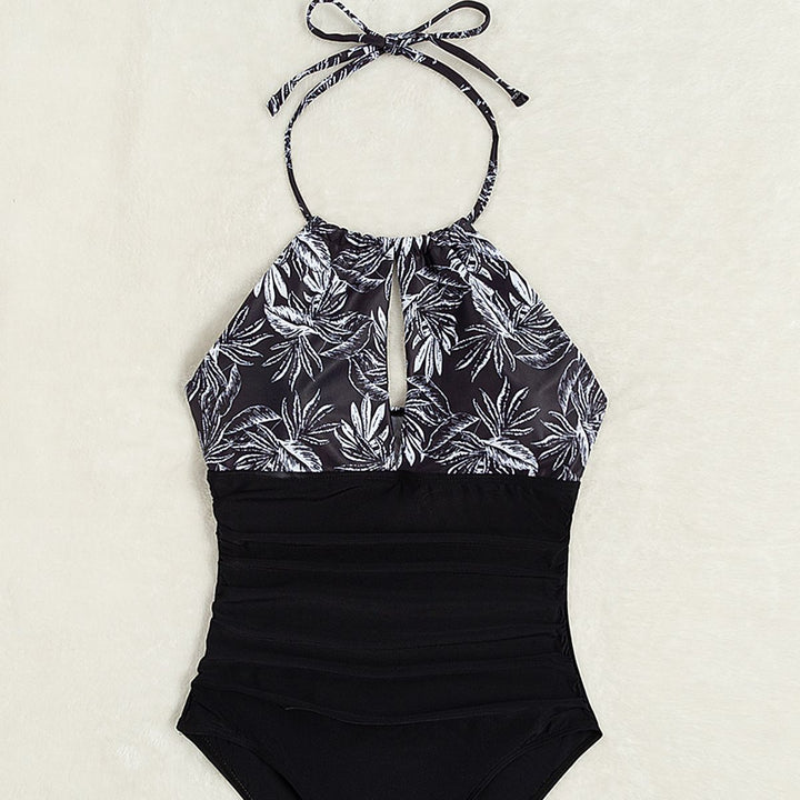 Ladies elegant one-piece swimsuit with floral pattern and figure-flattering elements Mune Fashion