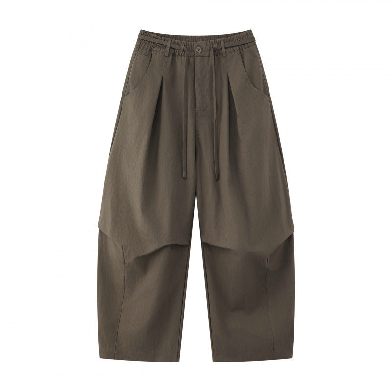 Unisex wide layered pants with balloon-shaped silhouette, high waist and drawstring Mune Fashion
