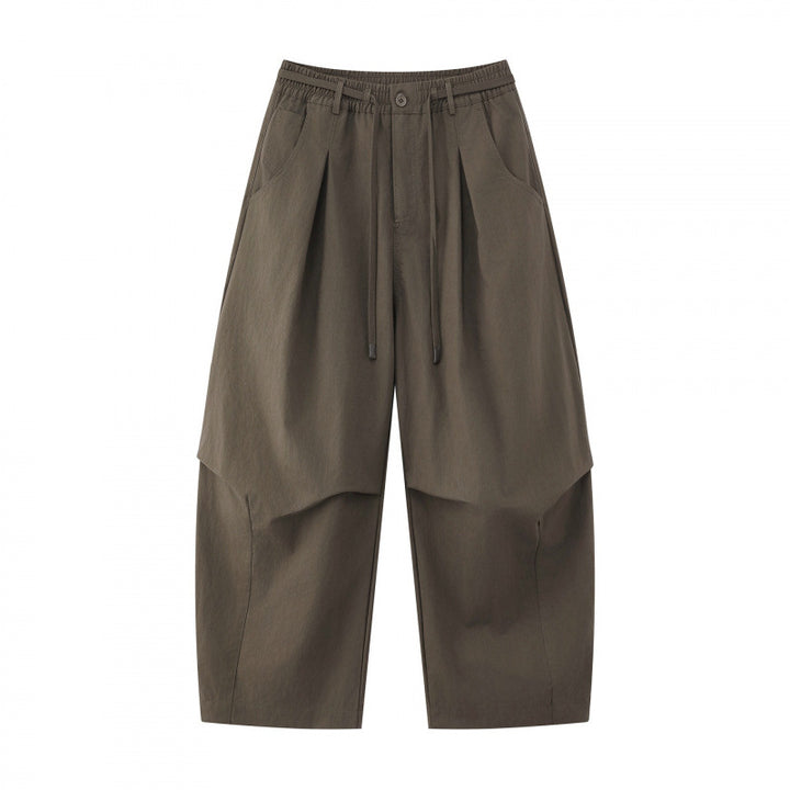 Unisex wide layered pants with balloon-shaped silhouette, high waist and drawstring Mune Fashion