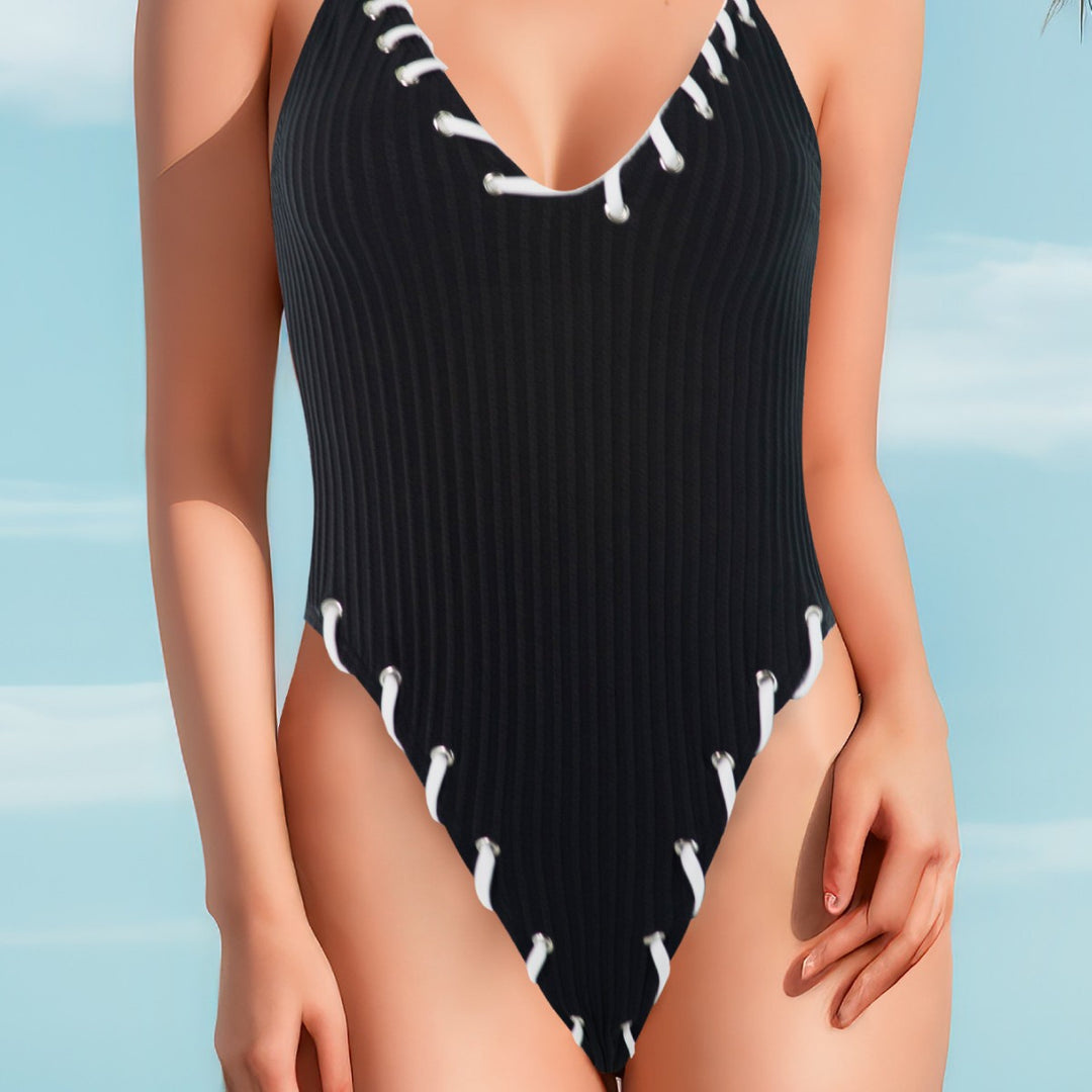Women's one-piece swimsuit with seductive lace-up design and deep V-neck Mune Fashion