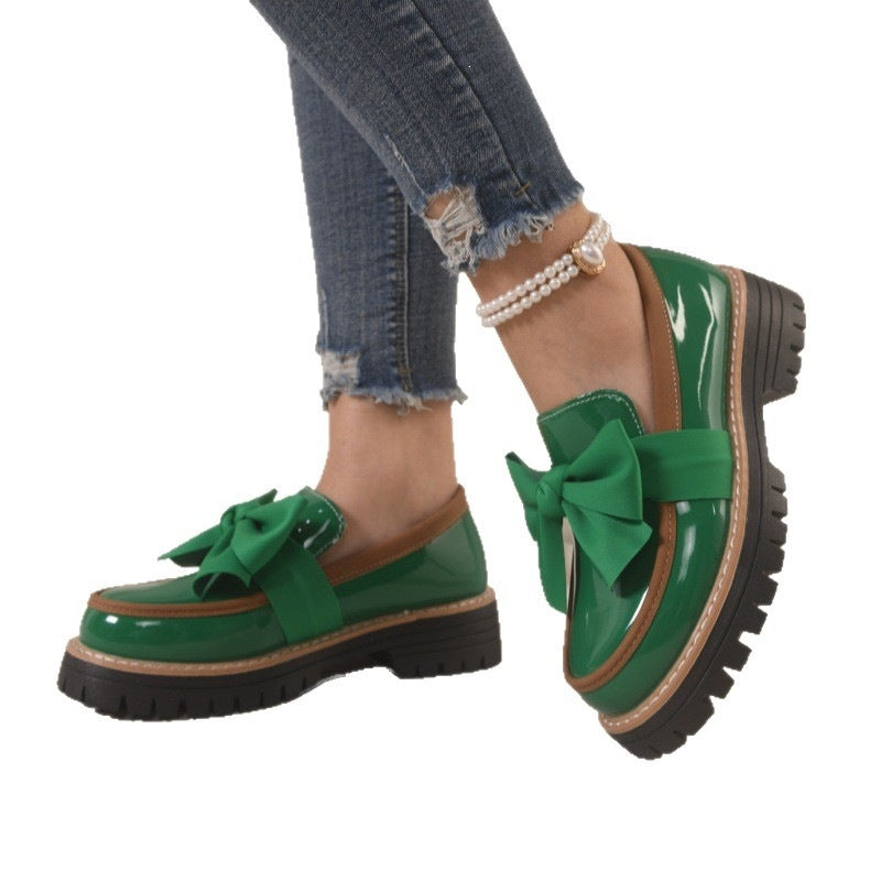 Women's patent leather loafers with large decorative bow and profiled rubber sole Mune Fashion