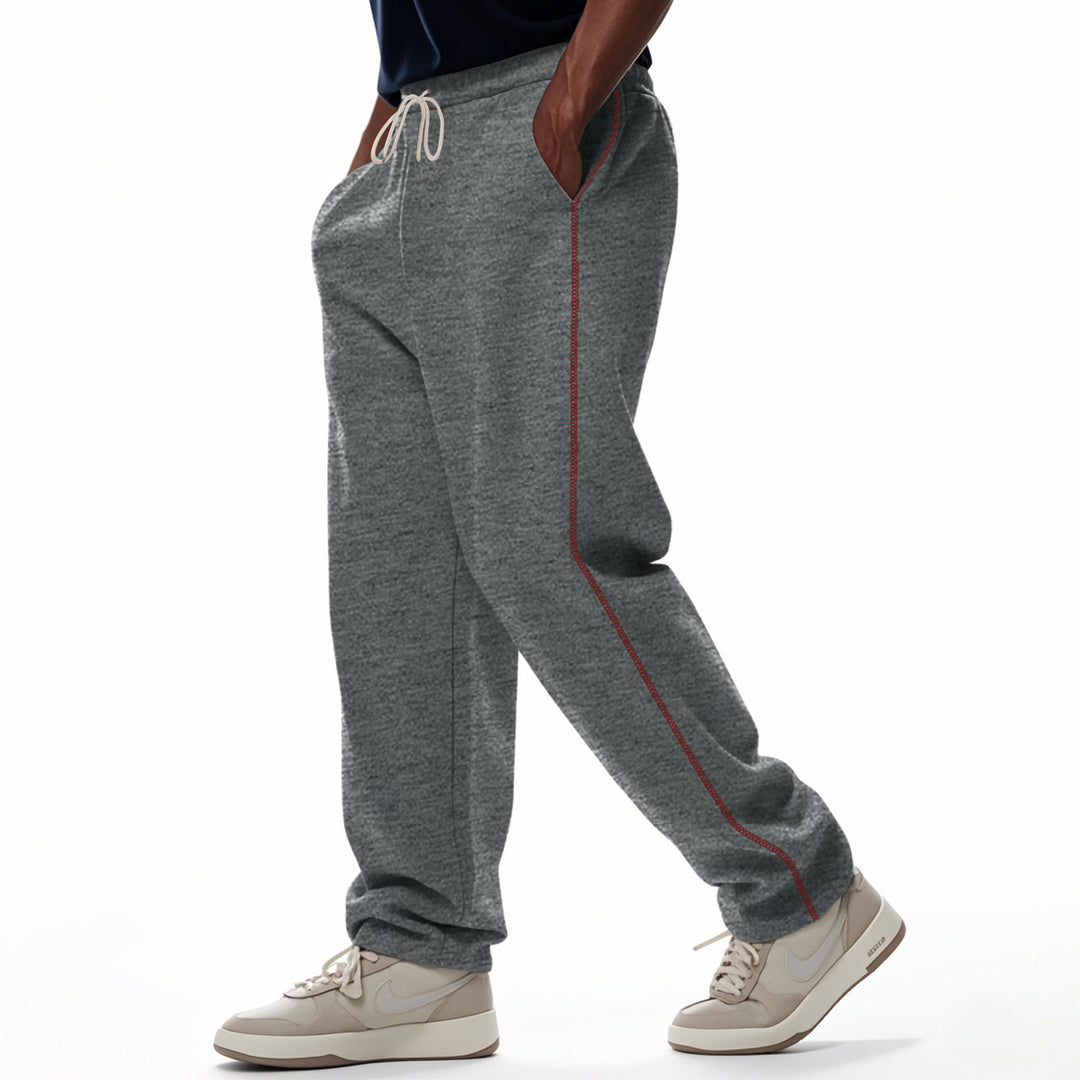 Men's casually fitting sweatpants with side decorative seam, elastic comfort waistband, and deep side pockets Mune Fashion