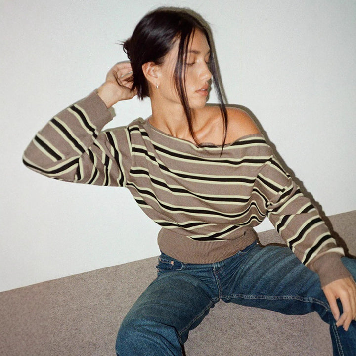 Women's fine knit boatneck pullover with asymmetrical shoulder drop, wide ribbed hem, and casual balloon sleeves Mune Fashion