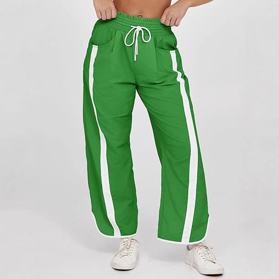 Women's nan relaxed track pants with side contrast stripe, elastic smocked waistband, and side pockets Mune Fashion