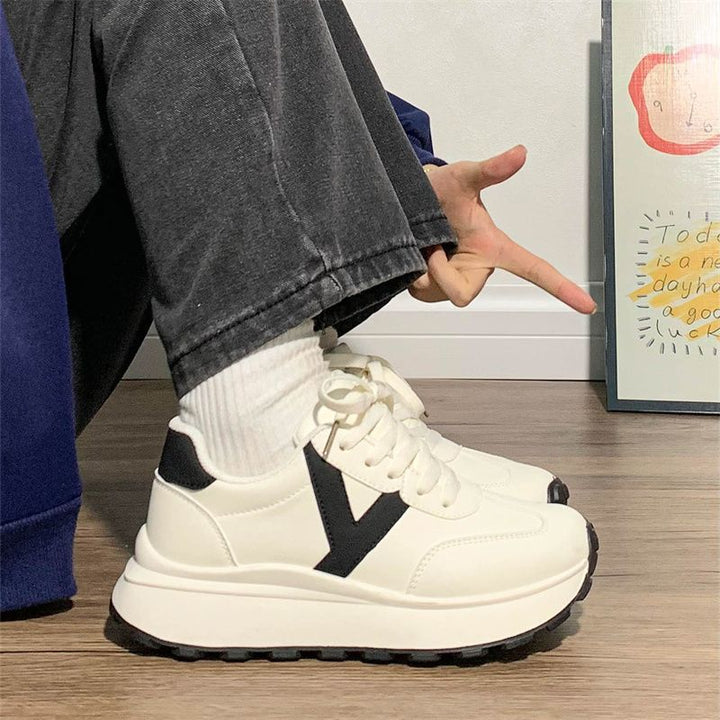 Women's platform sneaker with contrasting V design, thick tread sole and padded comfort collar Mune Fashion