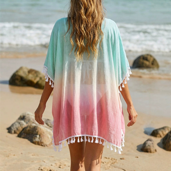 Women's casual beach poncho with fringed accents Mune Fashion
