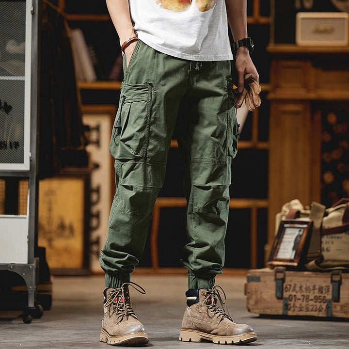 Men's military-inspired cargo pants with elastic tunnel drawstring waistband, flap and zipper pockets Mune Fashion