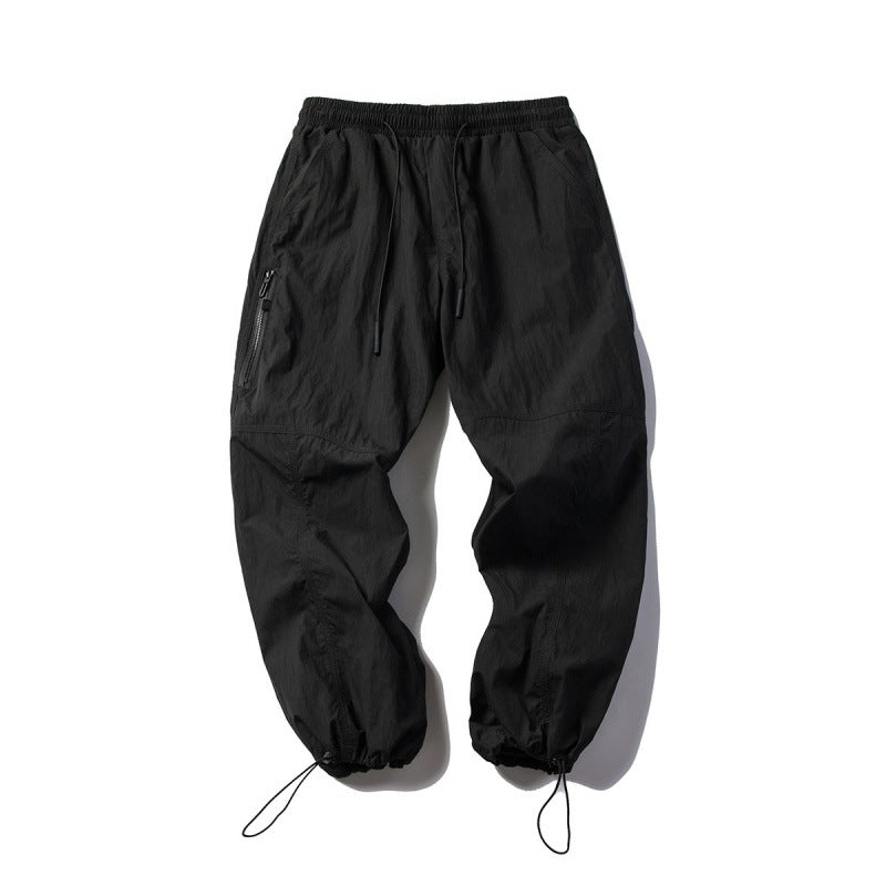 Unisex Technical Cargo Pants in Baggy Cut with Drawstring Waist and Adjustable Leg Closures Mune Fashion