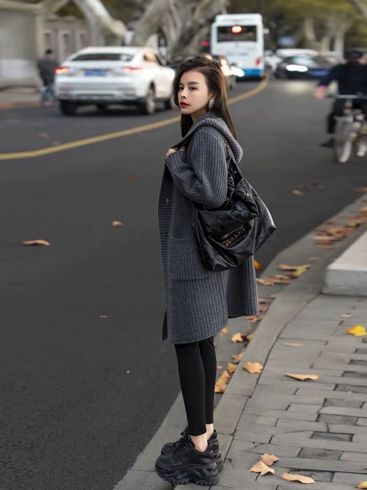 Women's Long Hooded Cardigan made of chunky rib knit with pocket inserts Mune Fashion