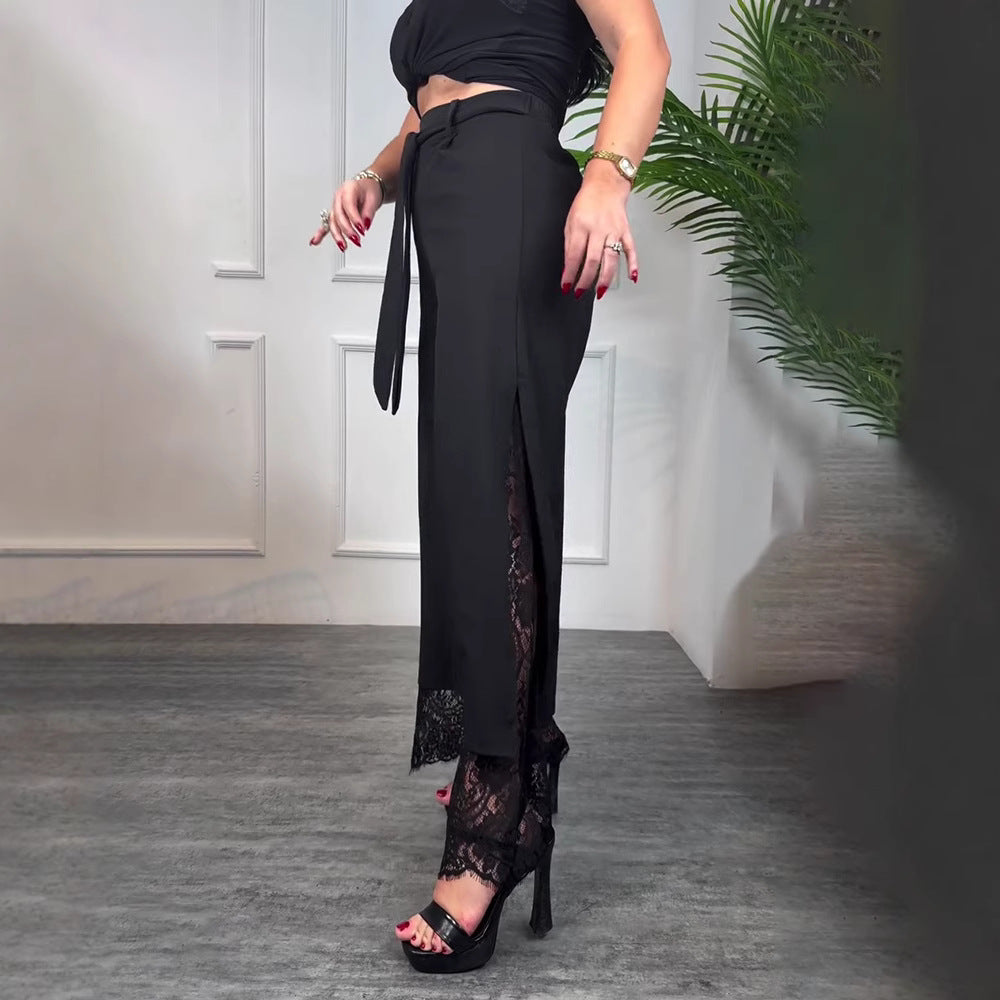 Women high-waisted tailored trousers with side slit, transparent lace underlay and tie belt Mune Fashion