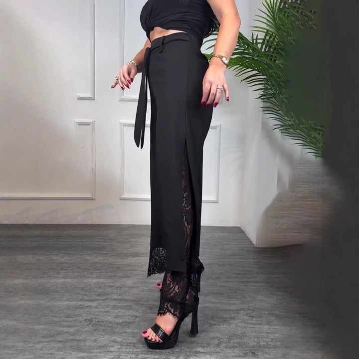 Women high-waisted tailored trousers with side slit, transparent lace underlay and tie belt Mune Fashion