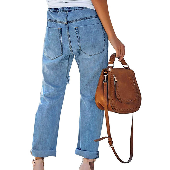 Women's casual destroyed denim jogger with elastic drawstring waistband and patch front pockets Mune Fashion