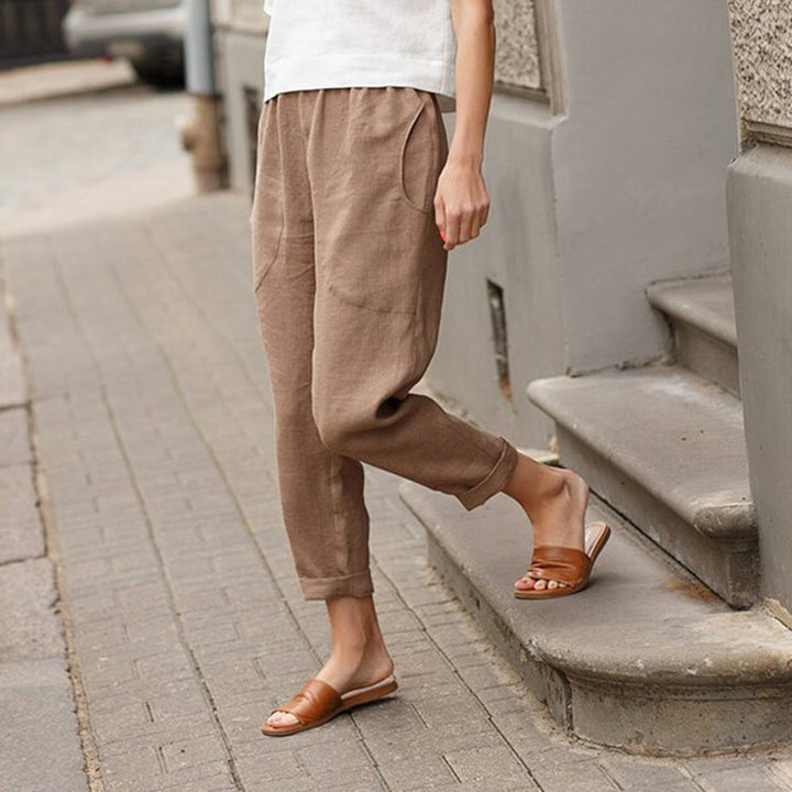 Women's light linen pants with elastic waistband, side pockets, and rolled hem Mune Fashion