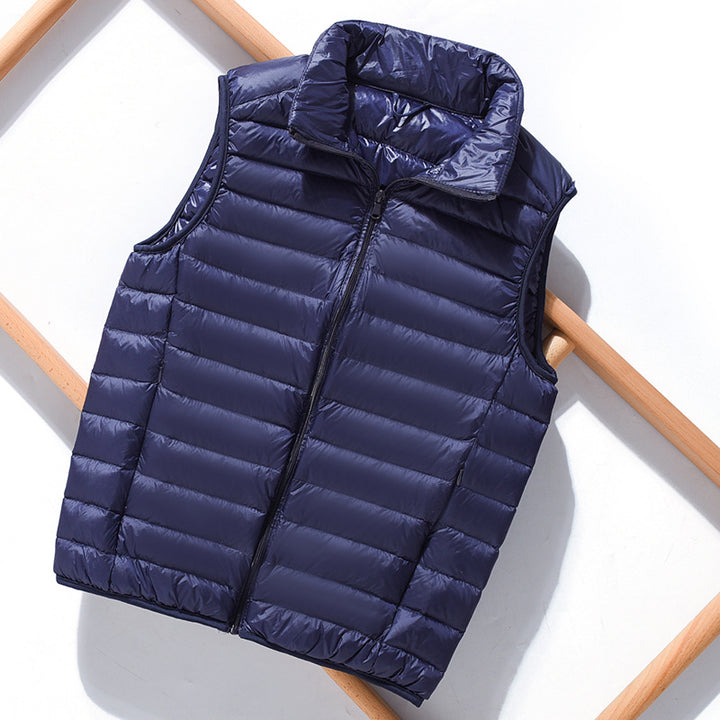 Women's lightweight packable quilted vest with high collar and wind-resistant microfiber shell Mune Fashion
