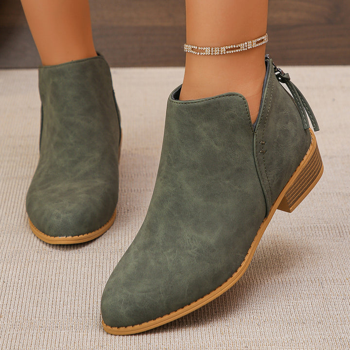 Women's fashionable short ankle boots with rear zipper, low block heel, and padded comfort insole Mune Fashion