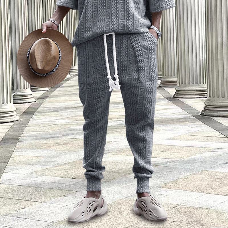 Men's cable-knit joggers with drawstring, patch pockets, and ribbed cuffs Mune Fashion