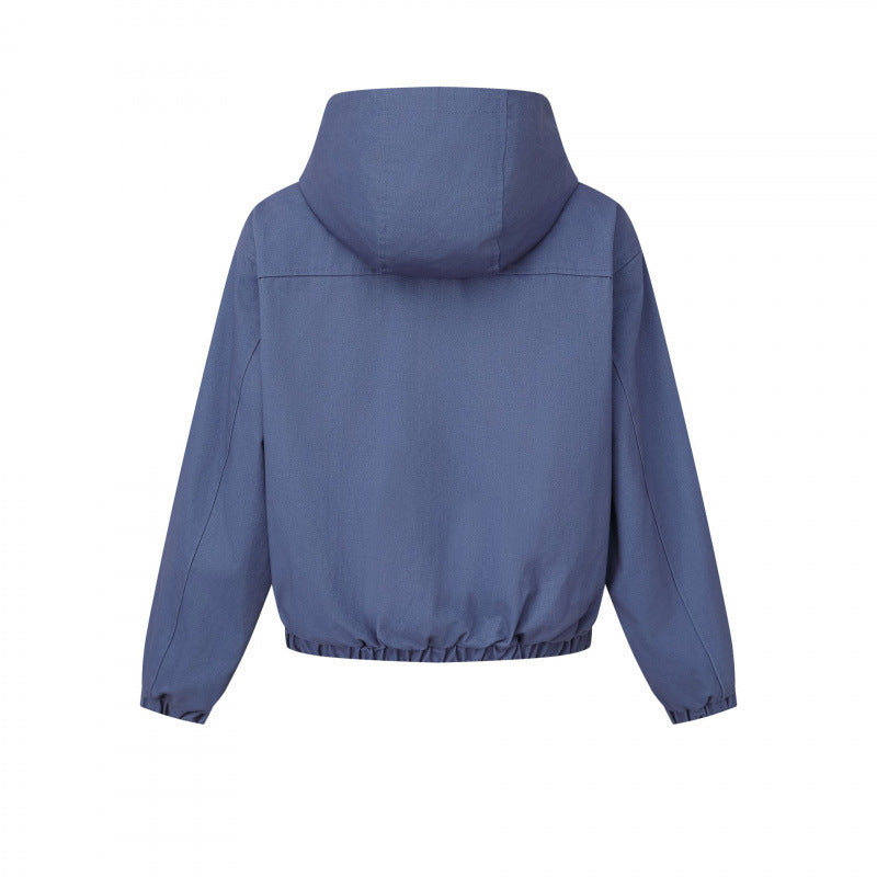 Ladies short cut hooded blouson jacket with textured fabric, patch pockets, and elastic hem Mune Fashion