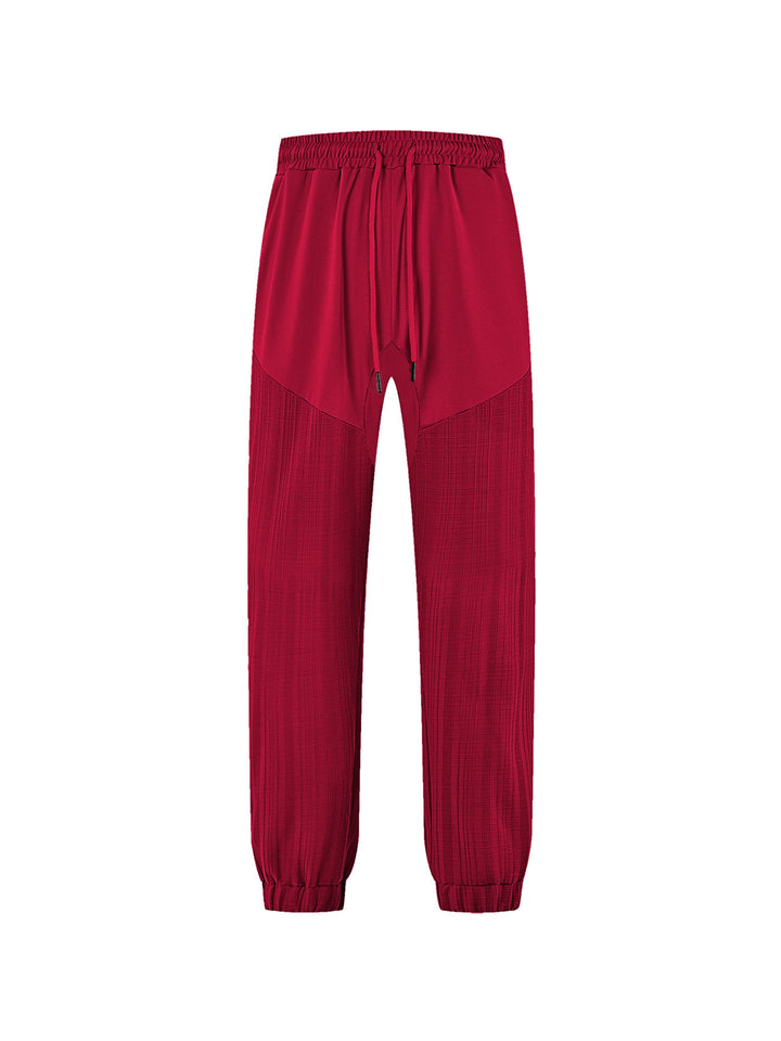 Men's slim-fit jogging pants with elastic drawstring waistband and textured knee panel Mune Fashion