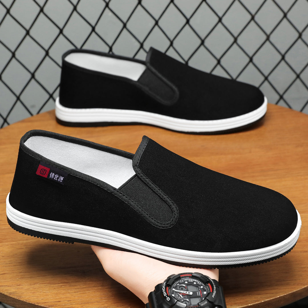 Men's lightweight canvas slip-on casual shoe with elastic entry, padded insole, and grippy rubber outsole Mune Fashion