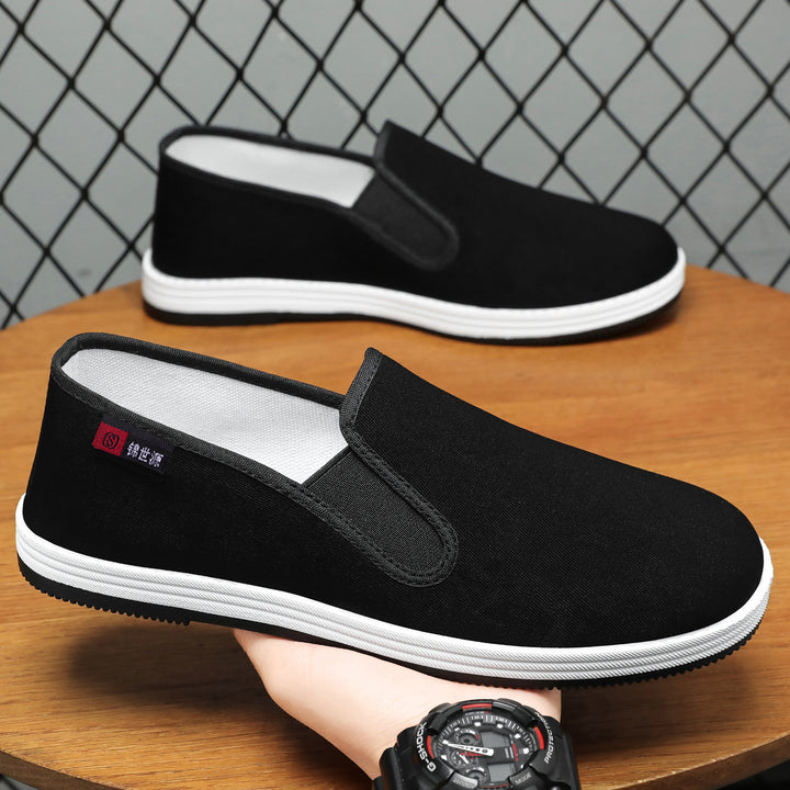 Men's lightweight canvas slip-on casual shoe with elastic entry, padded insole, and grippy rubber outsole Mune Fashion