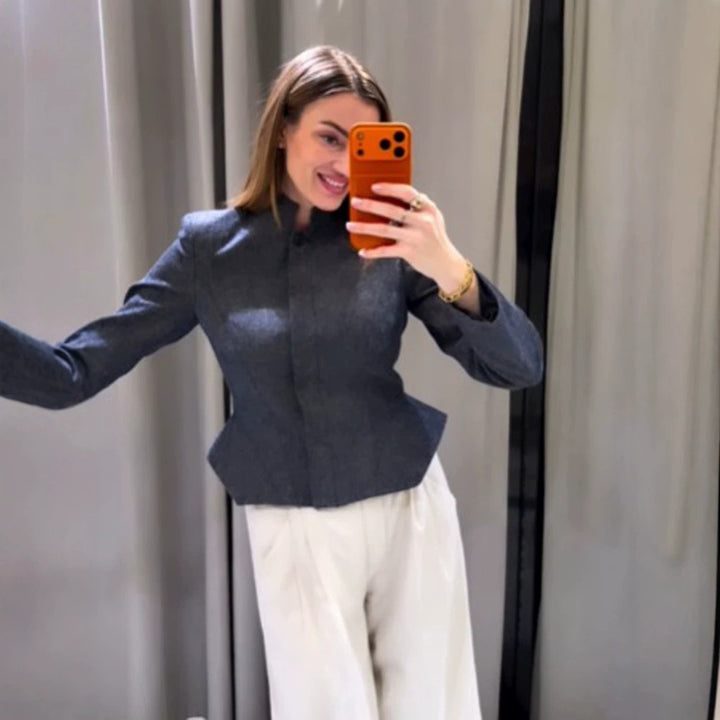 Women's short blazer with stand-up collar, fitted peplum, and concealed button placket Mune Fashion