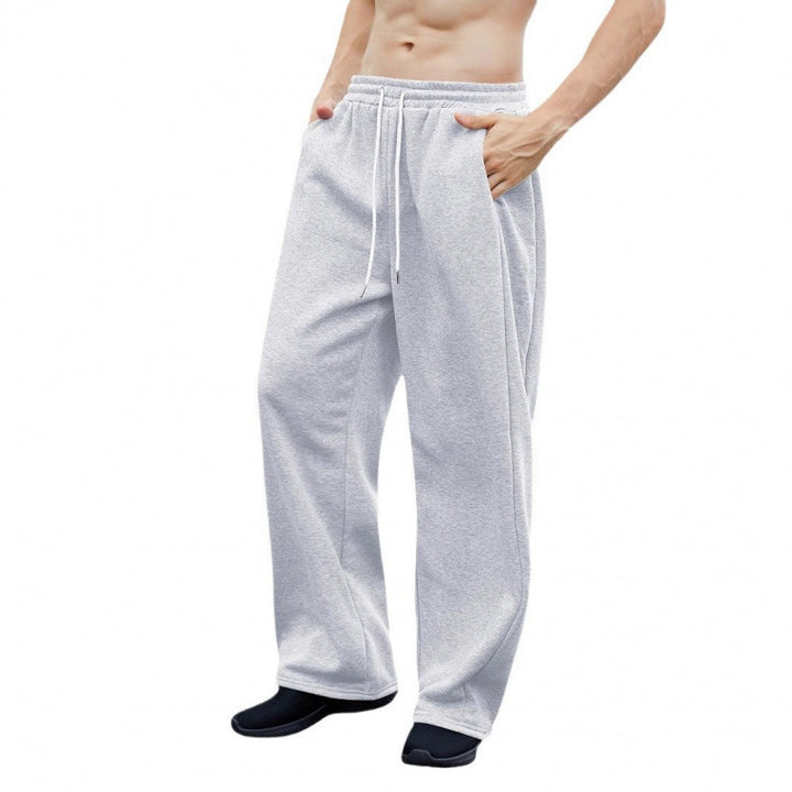 Women's wide oversize jogging pants with a deep crotch, elastic waistband, and drawstring Mune Fashion