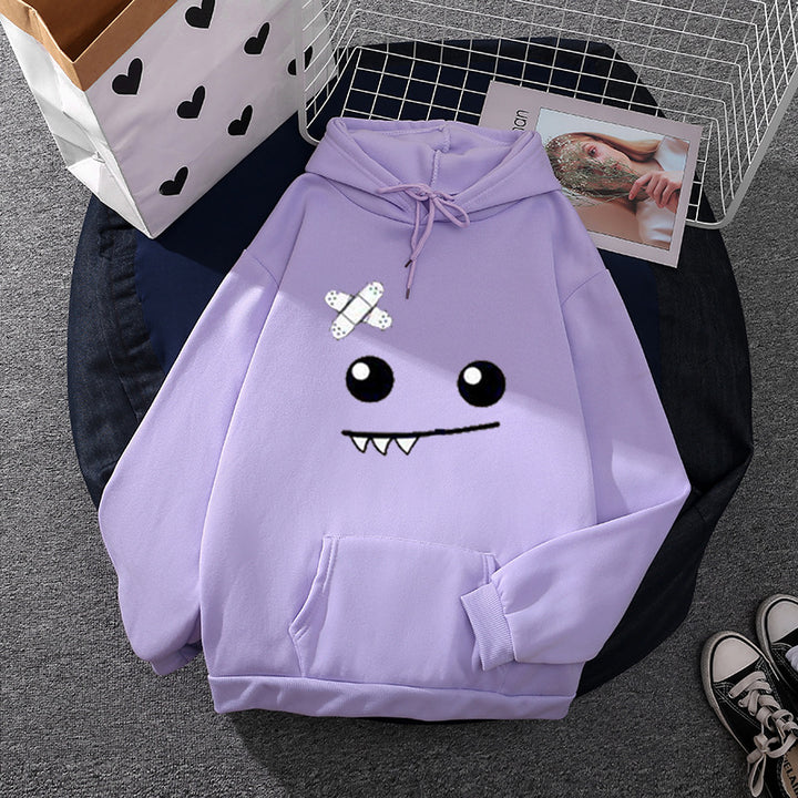 Women's hoodie with playful monster face, bandage application and kangaroo pocket Mune Fashion