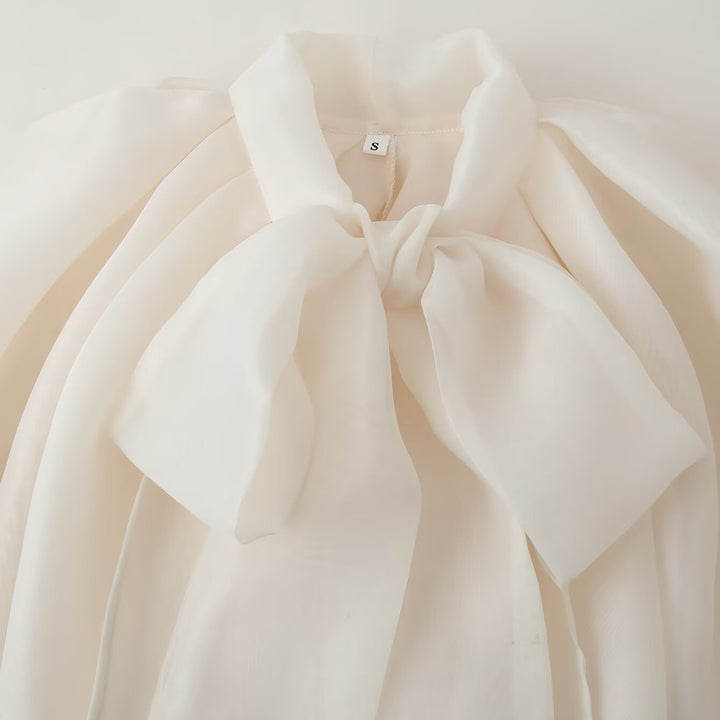 Women's sleeveless chiffon blouse with bow collar Mune Fashion