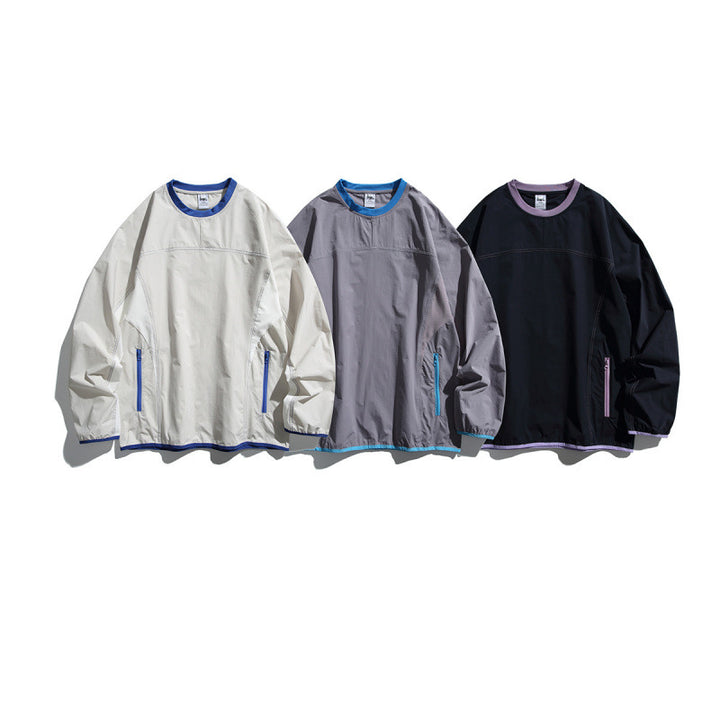 Unisex Lightweight technical oversized sweater with round neckline, zippered pockets, and contrasting finishes Mune Fashion