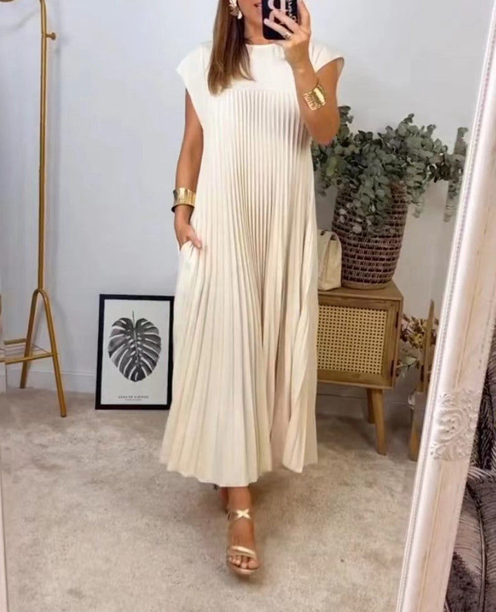 Women's flowing pleated maxi dress with dropped shoulders and side pockets Mune Fashion