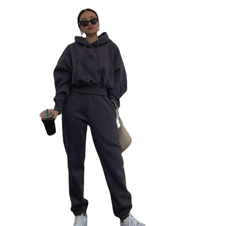 Women's short oversized hoodie set with elastic high-waist joggers made of cotton fleece Mune Fashion