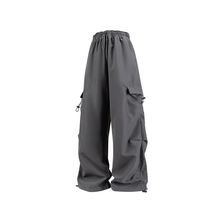 Men's wide technical cargo pants with drawstring waistband, multiple pockets and corded closure Drune