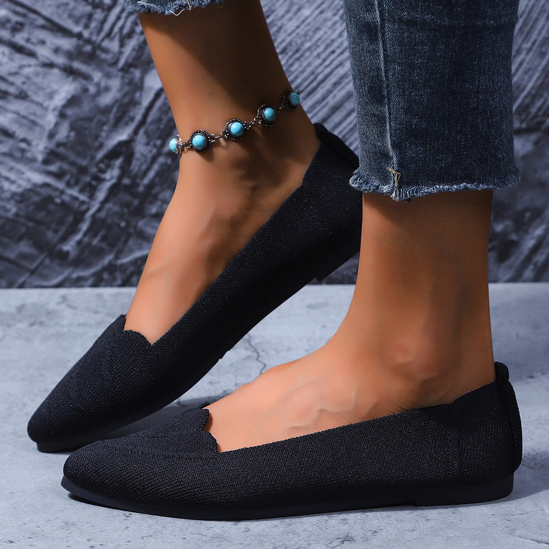 Ladies' pointed ballerina slippers with wavy edge trim and knitted upper Mune Fashion