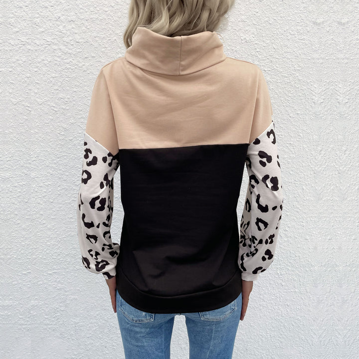 Women's colorblock sweatshirt with rollover collar and animal print sleeves Mune Fashion