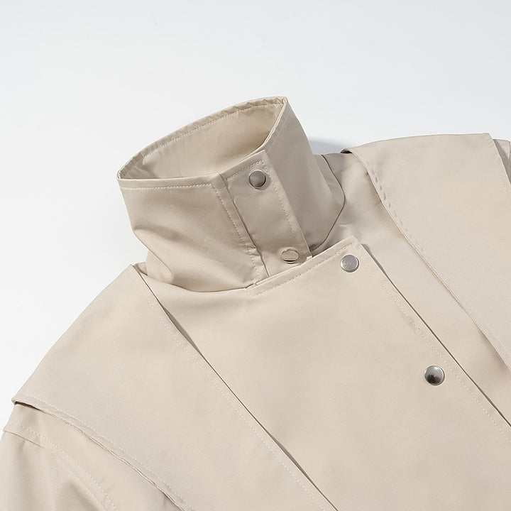 Women's short jacket with cape shoulder, stand-up collar and waist belt Mune Fashion