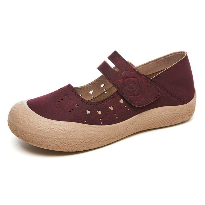 Women’s comfortable Mary-Jane slipper with Velcro closure, perforated heart pattern and shock-absorbing lightweight sole Mune Fashion