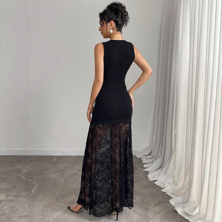 Women two-piece evening set with tailored vest and floor-length lace overlay skirt Mune Fashion