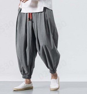 Men's unusual harem-style balloon pants with pleats, elastic waistband, and drawstring Mune Fashion