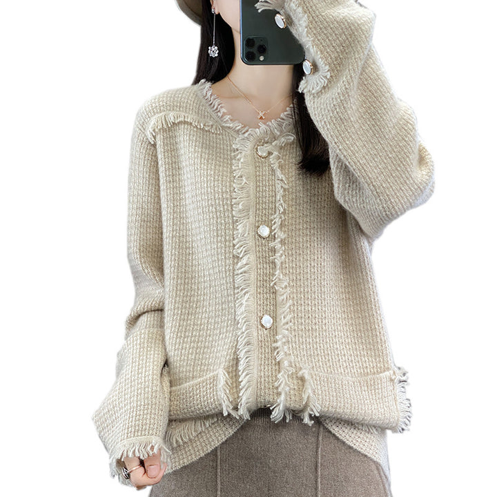 Women's knitted cardigan with fringe trim, mother-of-pearl button placket, and patch pockets Mune Fashion
