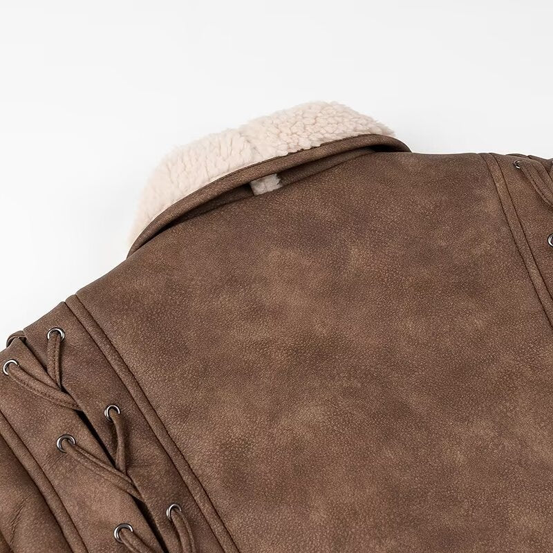 Ladies short jacket in aviator look with sherpa lining, tie belt and shoulder lacing Mune Fashion