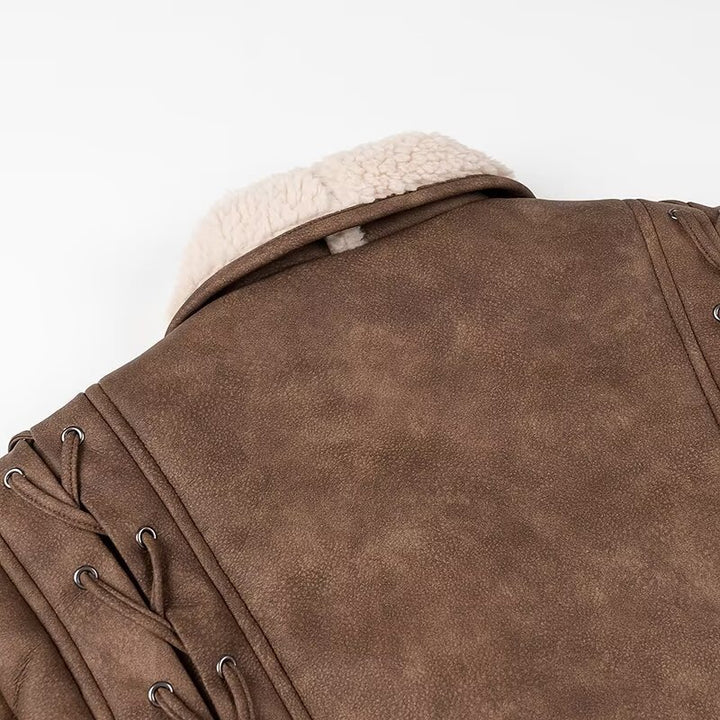 Ladies short jacket in aviator look with sherpa lining, tie belt and shoulder lacing Mune Fashion