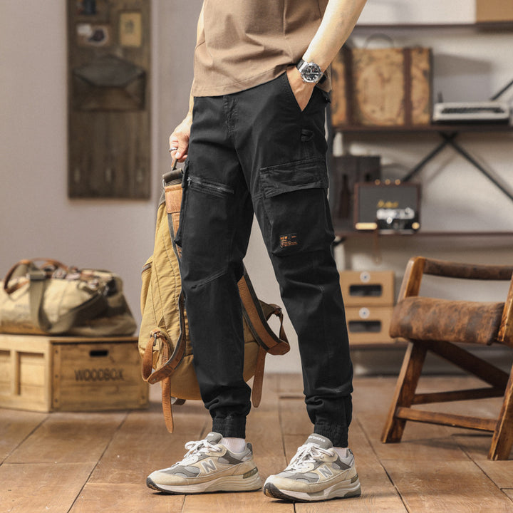 Herren Konisch geschnittene Cargo-Jogginghose mit Mehrfach‑Taschen, Reißverschluss‑Beintasche und elastischem Knöchelabschluss Mune Fashion