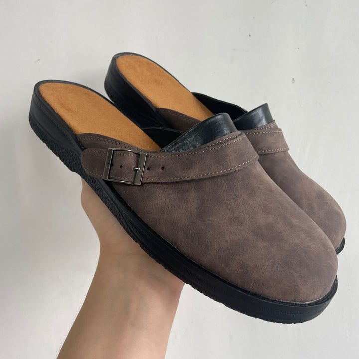 Women's faux leather slide with adjustable buckle strap and cushioned comfort footbed Mune Fashion