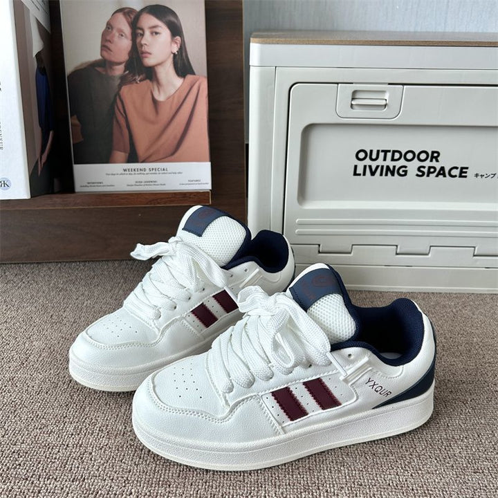 Women's sporty sneakers in retro look with color accents Mune Fashion