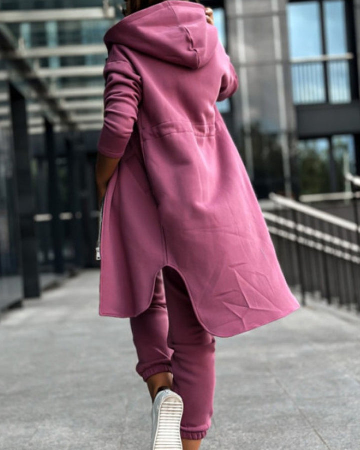 Women's long sweat hoodie jacket with two-way zipper, drawstring waist, side pockets, and side slits Mune Fashion