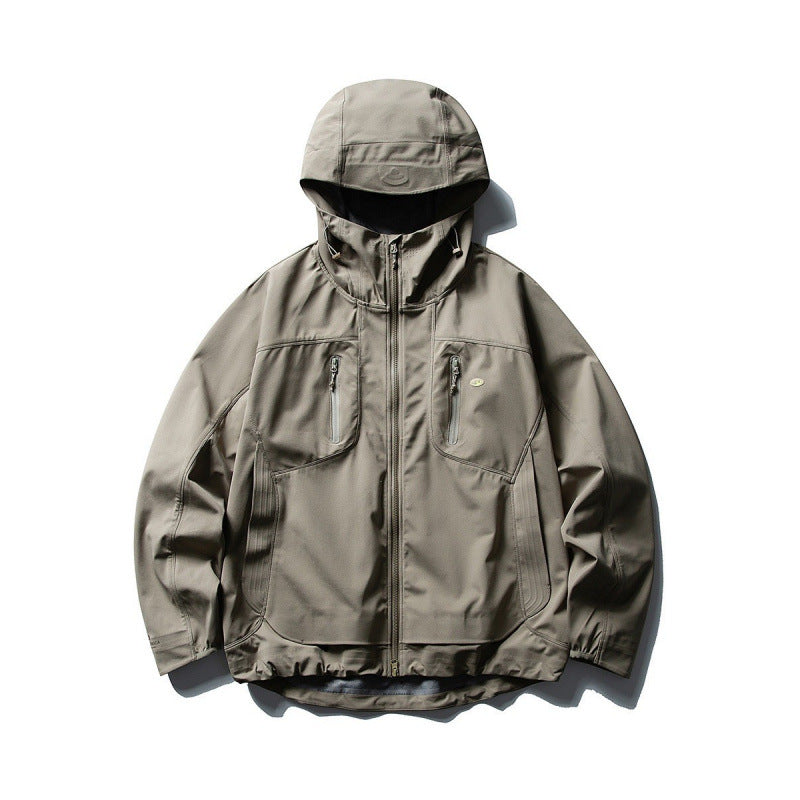 Unisex Technical Softshell Field Jacket with welded seams, four zippered pockets, and extended back part Mune Fashion