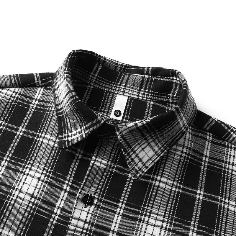 Men's checkered oversized flannel shirt with patch pocket, round hem, and buttoned front Mune Fashion
