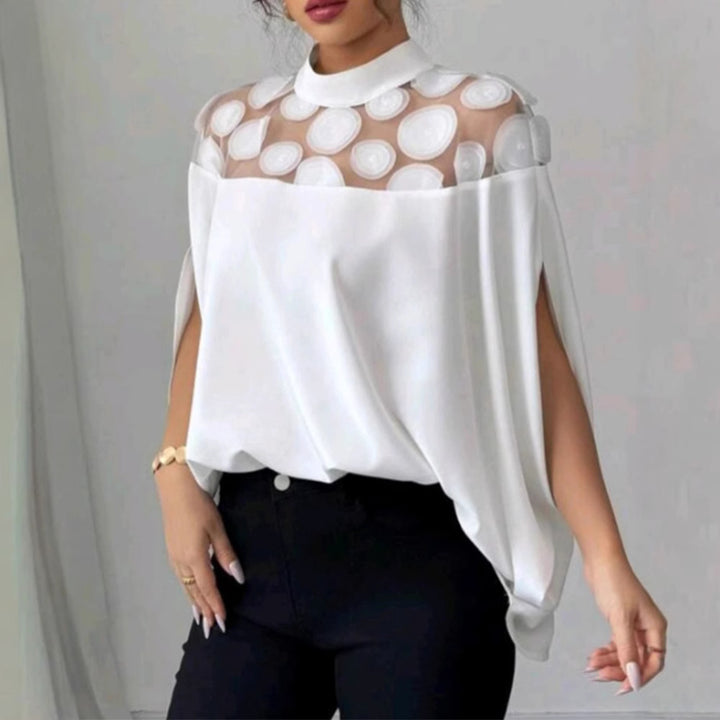 Women's elegant tunic blouse with stand-up collar, transparent round application panel and cape sleeves Mune Fashion